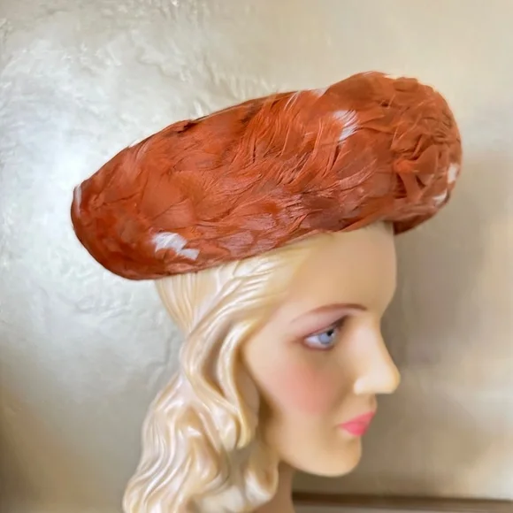 REFINED 1960s' HAT COVERED IN RUST COLORED FEATHERS